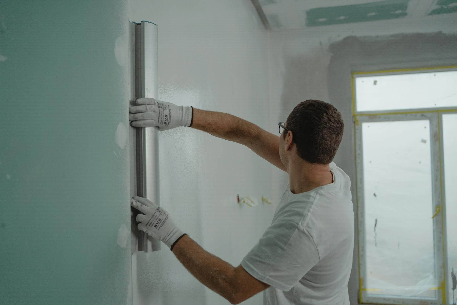 How long after plastering can you paint?